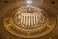 Federal Reserve cuts key rate by quarter-point and signals two more cuts this year