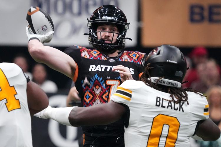 Arizona Rattlers quarterback Max Meylor (7) throws the ball against the Tucson Sugar Skulls at Desert Diamond Arena in Glendale on July 11, 2026.