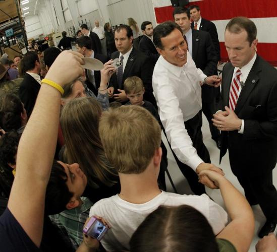 Santorum, Romney split Kansas, Wyoming    