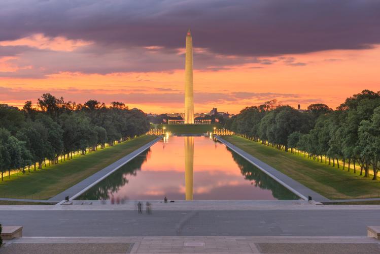 Washington Monument on the Reflecting Pool in Washington, D. C. USA at dawn