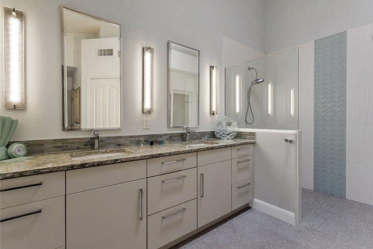 Remodeled-owners-bath-traded-outdated-tub-for-larger-curbless-doorless-walk-in-shower-and-former-shower-for-reach-in-closet.jpg
