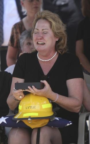 Funeral held for firefighter killed in unsolved hit-run    