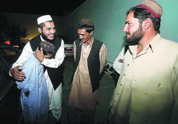 Ex-Gitmo detainee back with family  