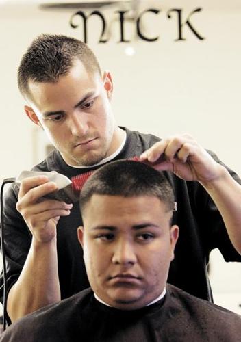 Barbers do new dos, based in tradition  