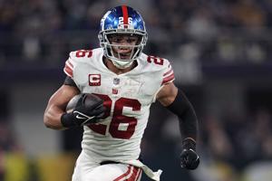 Giants' Barkley threatens hold out