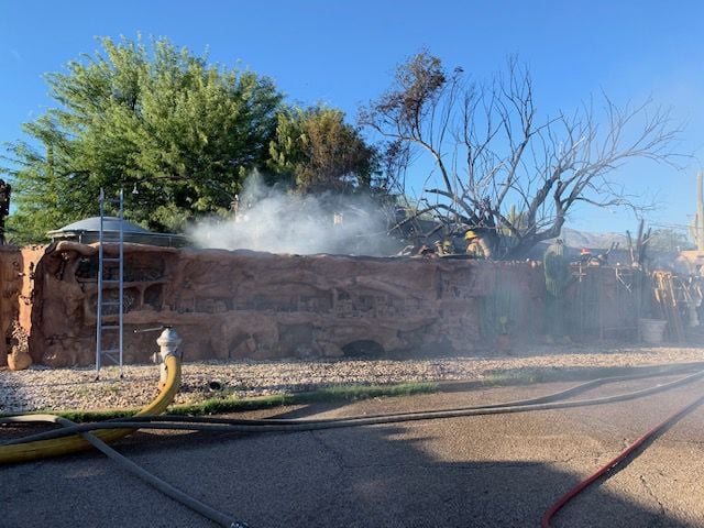 The Wall Guy's yard on fire