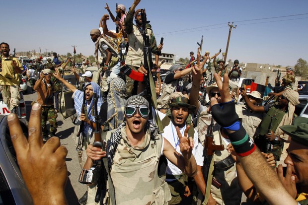 Rebels make gains, but Gadhafi loyalists keep resistance alive   