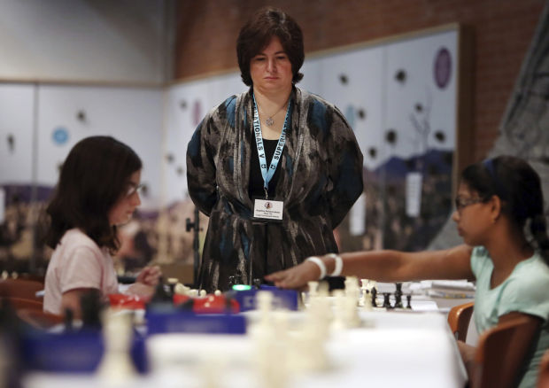 Chess champ shares love of game with kids    