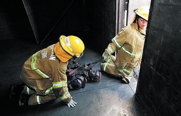 Girls learn firefighting skills at fire camp  