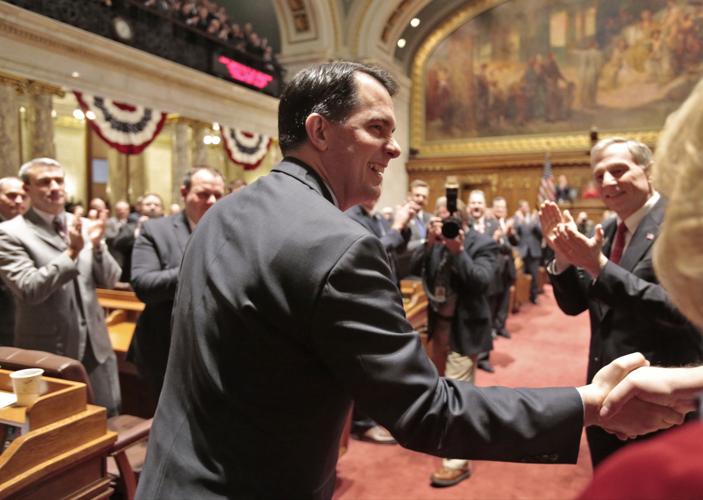 Gov. Scott Walker shakes hands