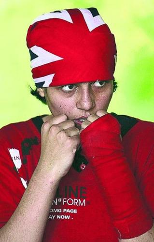 Afghan girls take up boxing, hoping to KO gender barriers  
