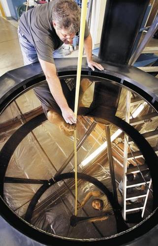 Tucson firm to receive award for collider work  