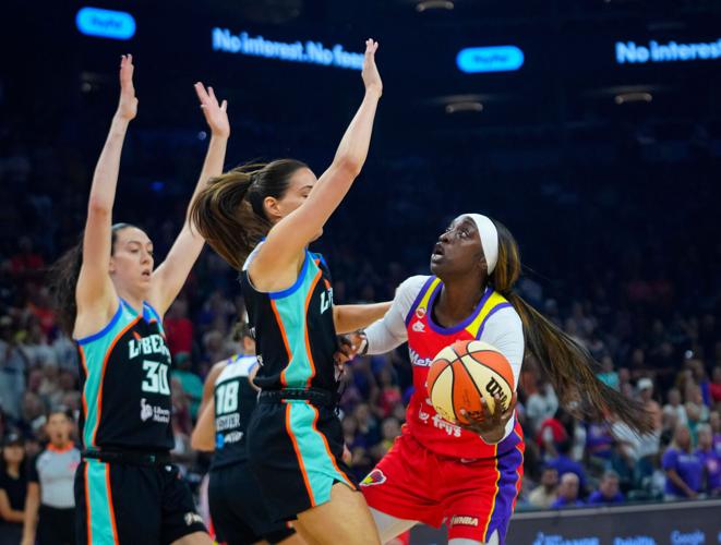 Mercury guard Kahleah Copper (2) goes up for a shot against Liberty guard Rebecca Allen (9) during a game at the Mortgage Matchup Center in Phoenix, on August 1, 2026.