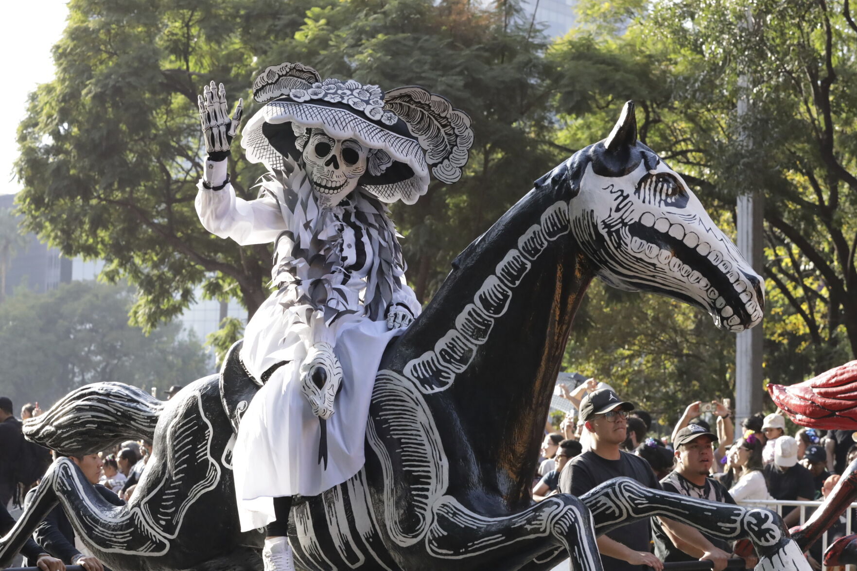 Skeletons, dancers join Mexico City's Day of the Dead parade