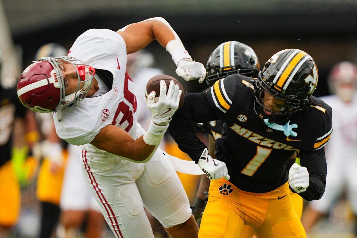 Oct 11, 2025; Columbia, Missouri, USA; Missouri Tigers safety Marvin Burks (1) injures Alabama Crimson Tide wide receiver Derek Meadows (30) and is ejected for targeting during the first half of the game at Faurot Field at Memorial Stadium. Mandatory Credi