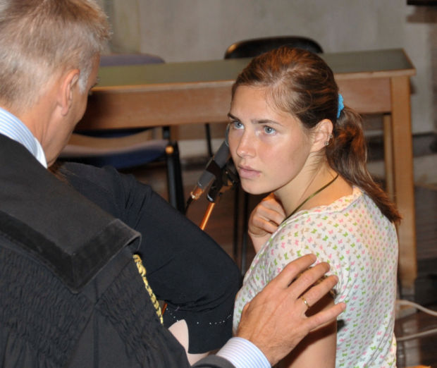 Amanda Knox talks with her lawyer