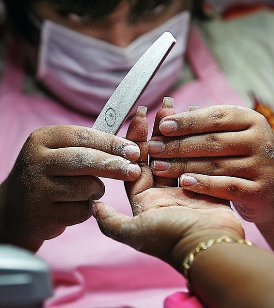 When it comes to doing nails, Tucson's Estrada is a champion Home