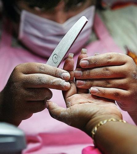 When it comes to doing nails, Tucson's Estrada is a champion  