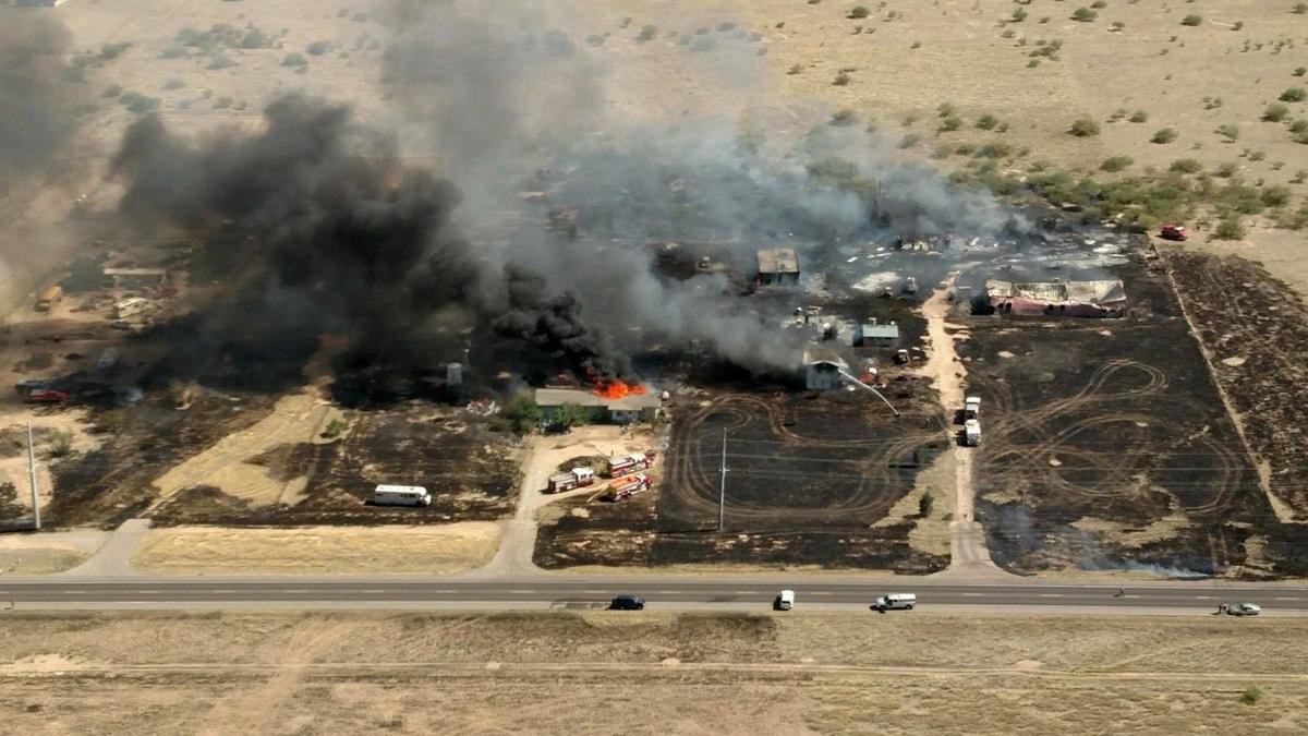 2 houses, several buildings burn in Cochise County wildfire; no
