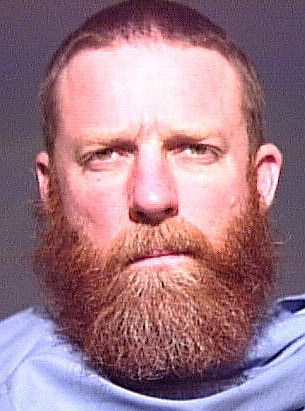 Ex-Hell's Angels chief held in slaying   