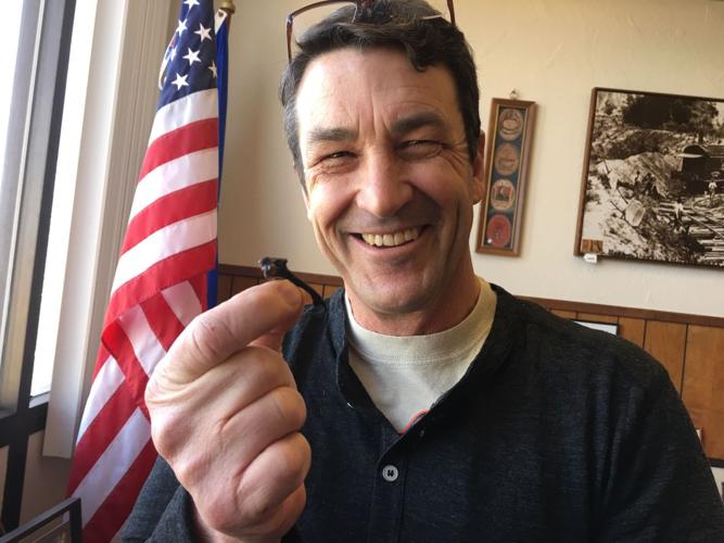 Ray Carroll's going-out-of-office sale raises money for charty