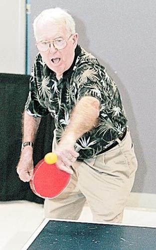 Seniors stay in shape playing table tennis  