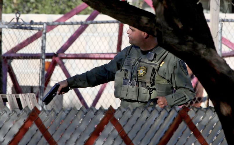 Armed suspects sought in midtown