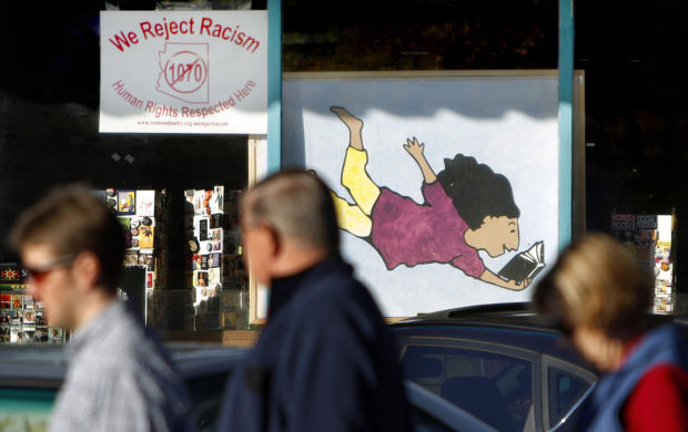 SB 1070: Antigone Books