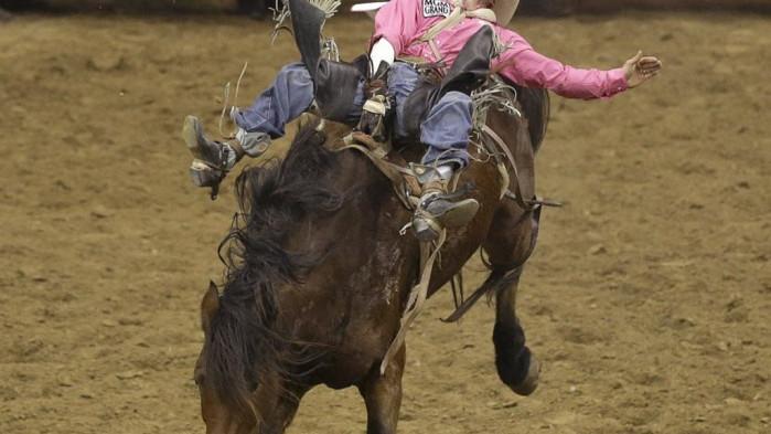 National Finals Rodeo: Brazile second in team roping, closer to record ...