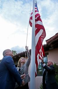 Memorial flag raised at home of Giffords, Kelly