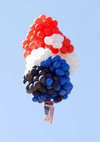 Storms force pair to abort lawn chair balloon flight    