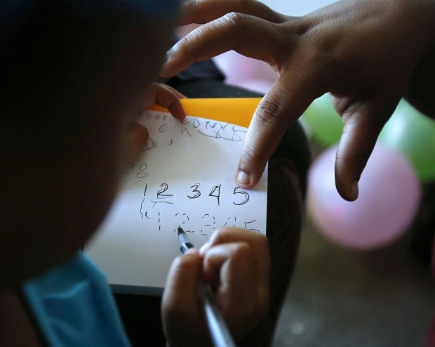 Child care's cost prolongs poverty    