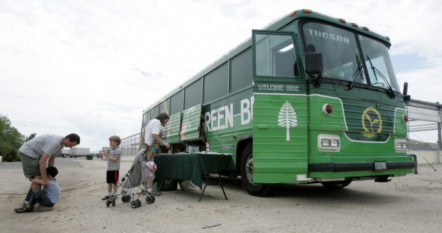 Finding where food comes from: Kids, parents plant, harvest with Big Green Bus, UA farm    