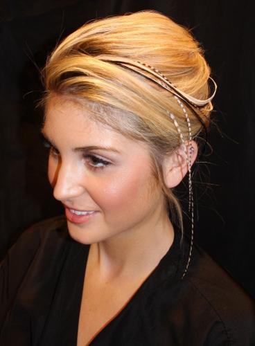 Hair feathers flying high   