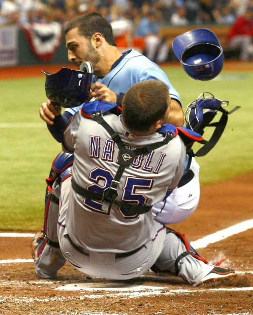 Baseball notebook: Napoli sent flying, is OK after collision   