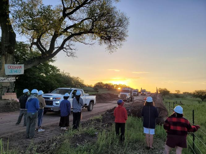 Tree-sit protest against border wall branches into Mexico