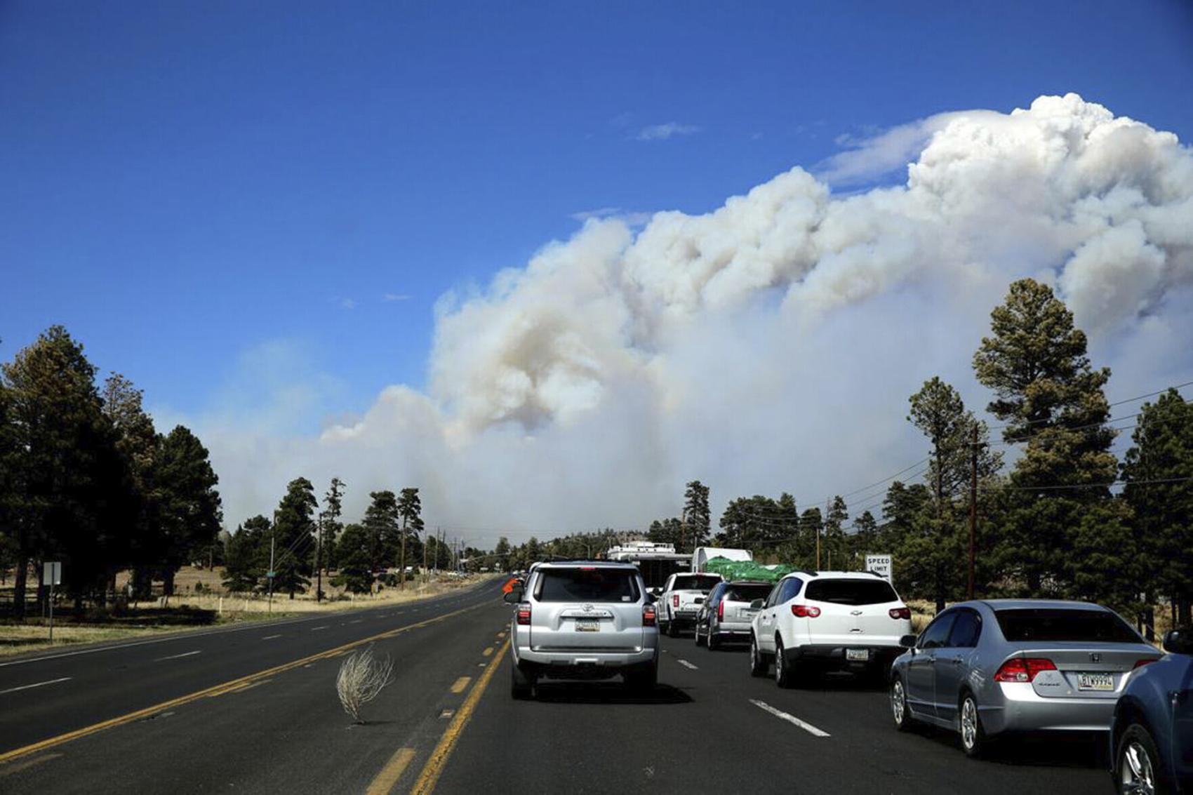 Photos Tunnel Fire burns through homes, national monument north of