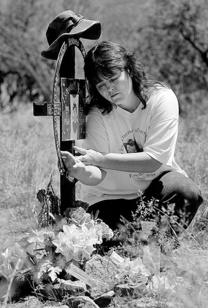 Friends, kin remember hunter slain in 2004  