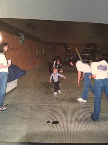 Grant House was everyone's little brother. He was about 2 in this picture, taken in 2000. His older sister, Ashley, was a sophomore, getting ready to go to a high school state meet. Her teammates treated him like family and many are among his biggest fans