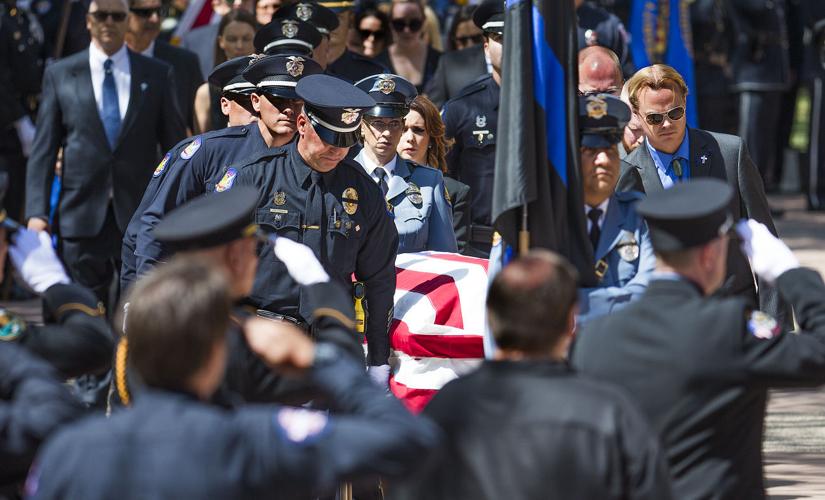 Slain Phoenix officer remembered as 'larger than life'
