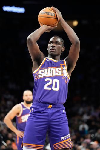 Phoenix Suns forward Rasheer Fleming (20) shoots a free throw against the Brooklyn Nets at Mortgage Matchup Center on Jan. 27, 2026, in Phoenix.