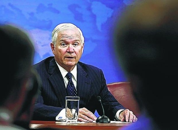 AP photo of dying Marine a slap at decency, Gates says  