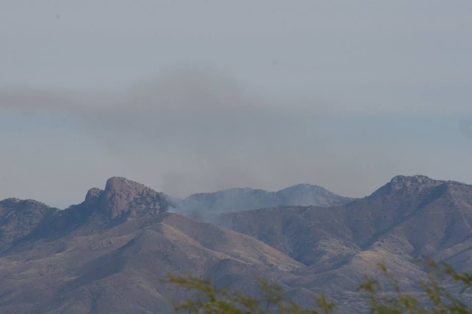 Grass fire near Gunsight Pass 50 percent contained