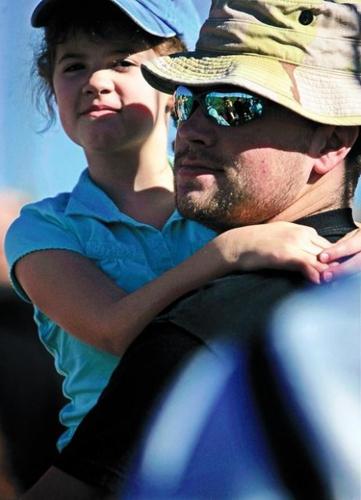 Desert museum visitors bask in warm sunshine, see sights  