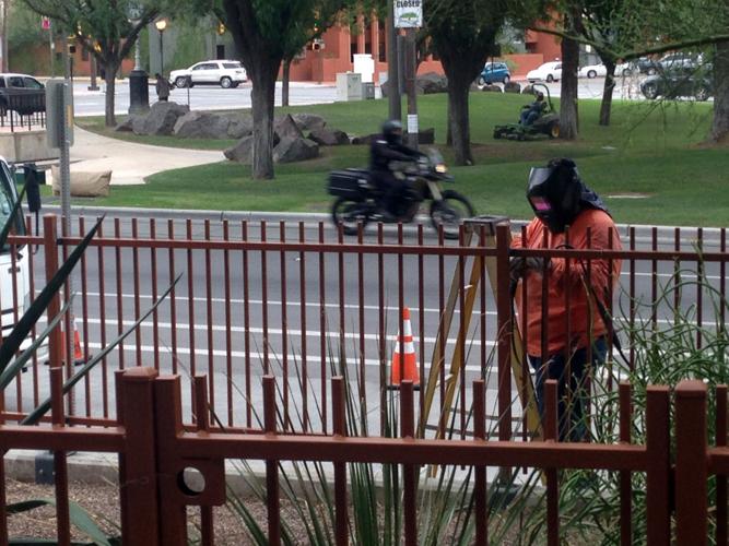 Iron fencing going up around county buildings downtown