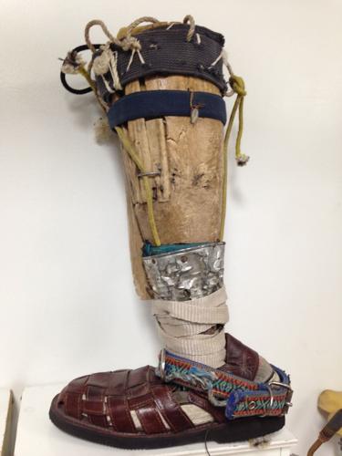 Carved wooden leg from ArSoBo clinic in Nogales, Sonora