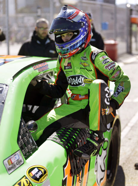 Auto racing: Danica makes history by taking Daytona pole