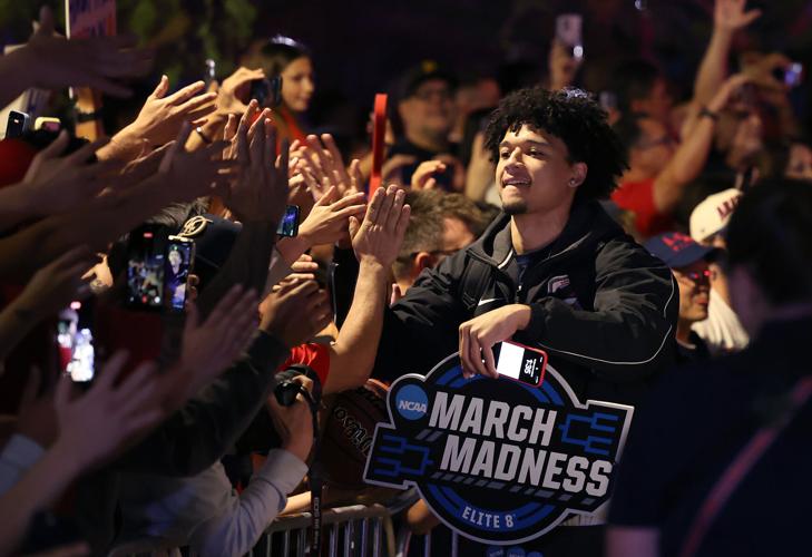 Fans celebrate the Arizona Wildcats
