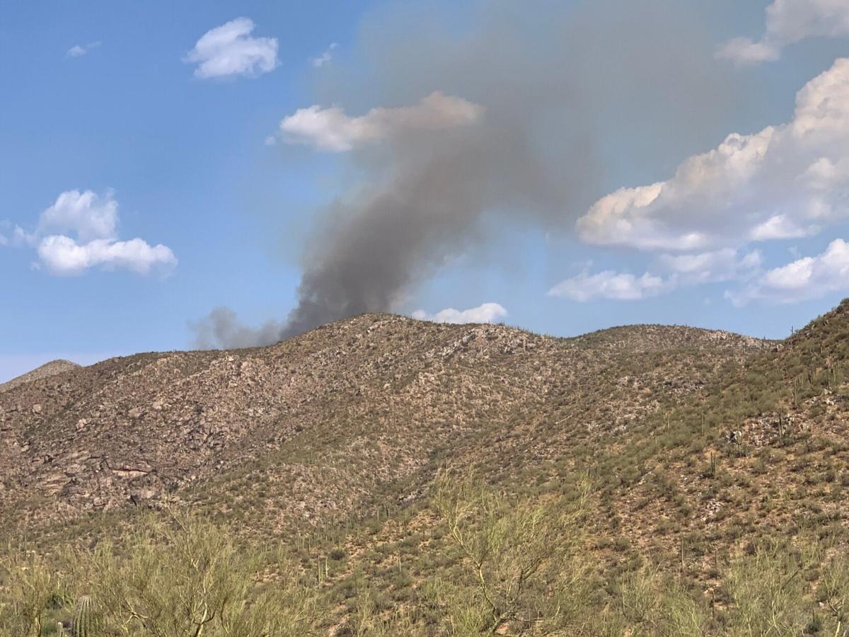 Fire burning in Tortolita Mountains northwest of Tucson