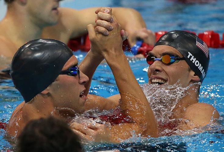 SPORTS OLY-SWM-M100BACK 1 LA